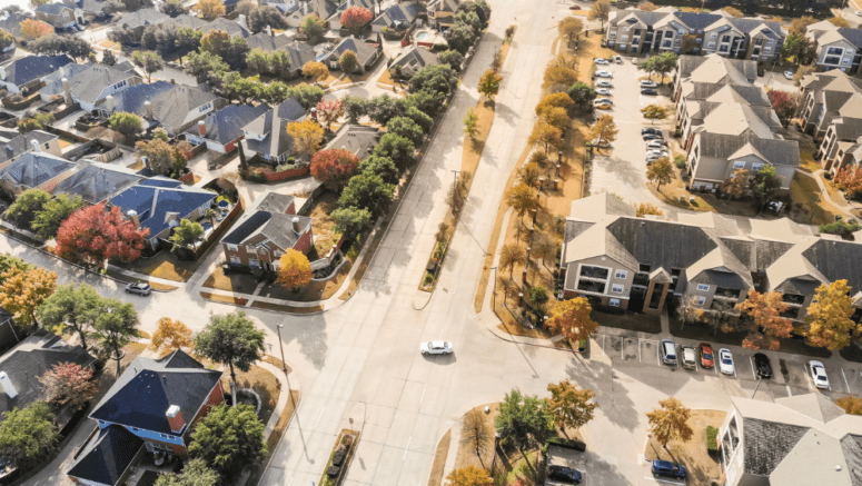 Aerial view of a neighborhood in Baytown where homeowners may be interested in the services of a we buy houses company