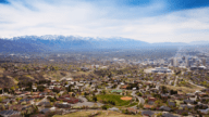 Aerial view of Salt Lake City, where home owners may be interested in the services of a we buy houses company