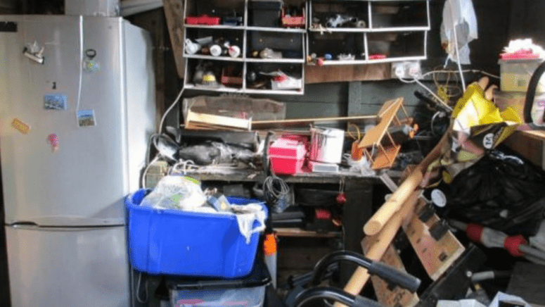 An image that shows a garage full of stuff in house.