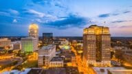 An image of the Winston-Salem skyline, where home owners can sell their home to a we buy houses company