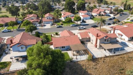 Aerial view of a neighborhood in Turlock, where homeowners have the options of selling their house to a we buy houses company