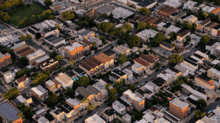 Aerial view of homes that you can sell as is in NY