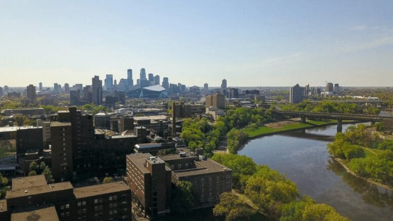 An aerial view of Minneapolis, MN, where houses are being sold to We Buy Houses companies.