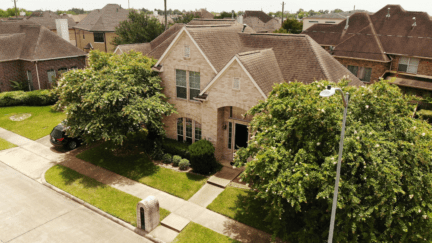 A house with a well-maintained roof that could attract roofing scammers.