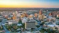 An aerial view of San Antonio, TX to represent home values in San Antonio, TX