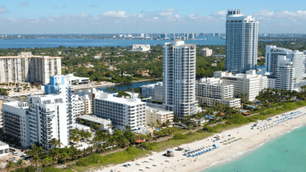 An aerial view of a city in Florida, where houses get sold to We Buy Houses companies.