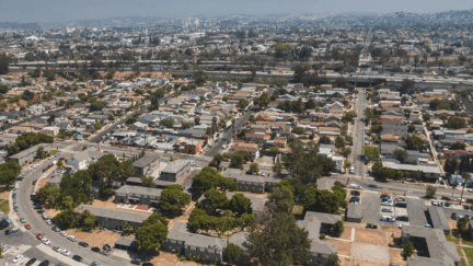 An aerial view of a neighborhood where a percentage of home buyers pay cash.