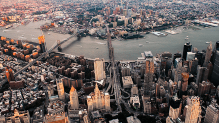 An aerial view of New York to represent its top real estate brokerages