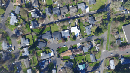 An aerial view of a neighborhood where a home might need an appraisal.