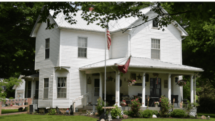 Where should you start when buying a home like this white two-story farmhouse.