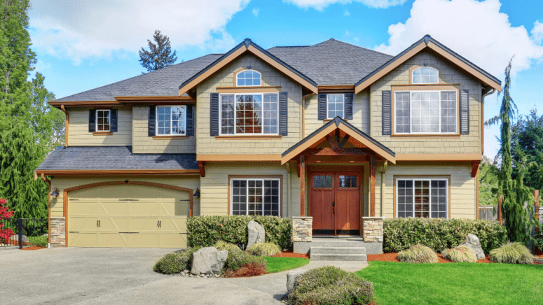 An image of a house with an estate sale company present.