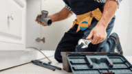 A plumber working for a homeowner who might not be able to afford their home repairs.