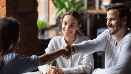 A discussion between the agent and home sellers on who pays the real estate agent