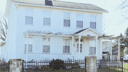 A photo of a Seattle home listed for a cash sale